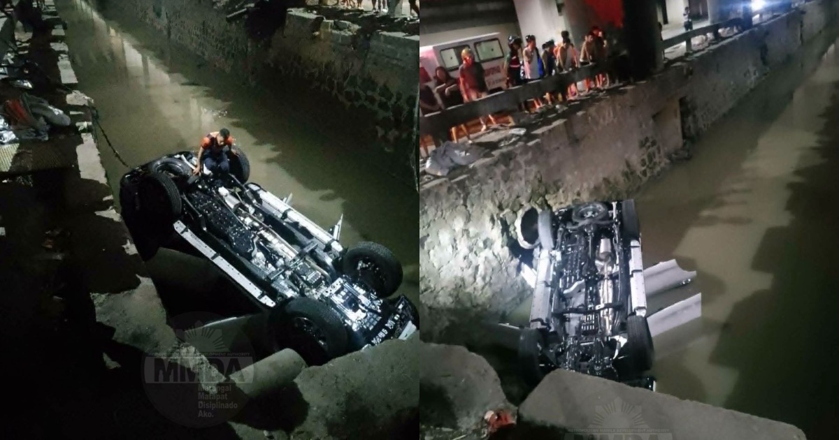 Alleged drunk driver rescued after SUV falls into creek in QC ...